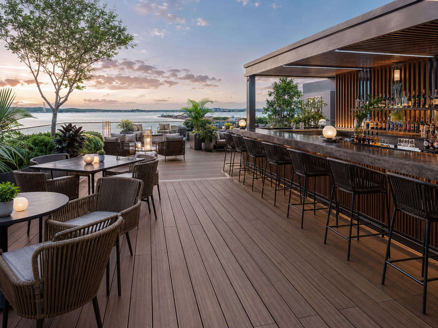 Upscale hotel bar terrace with realistic WPC composite decking, outdoor dining tables, bar seating, greenery and waterfront views.